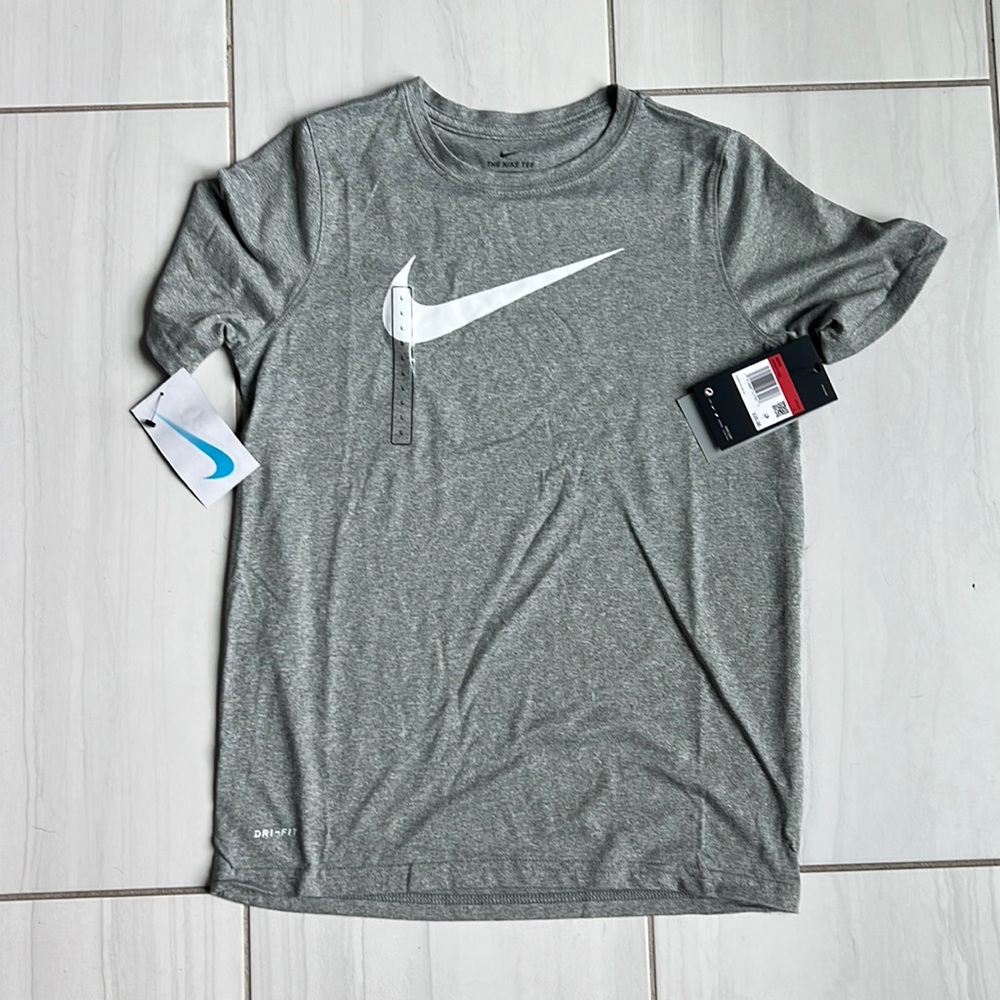 New with tags!  Grey Nike shirt